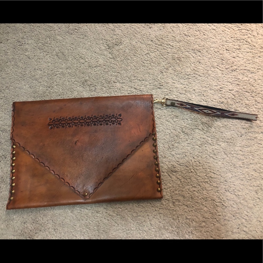 Hand tooled Leather Clutch